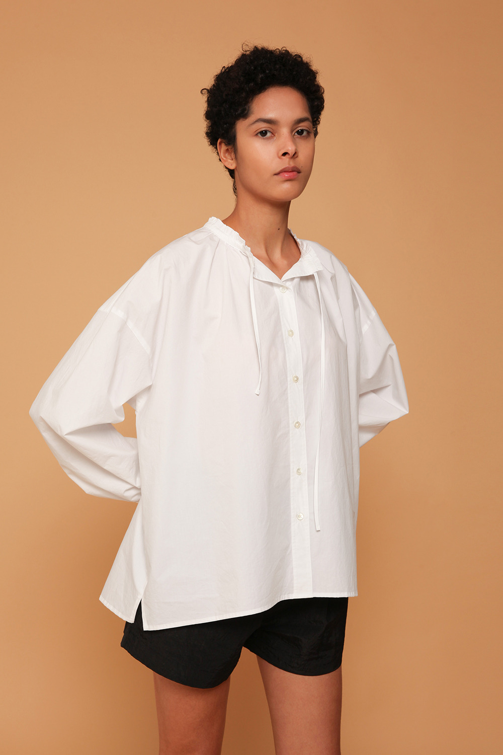 drawstring ruffled-neck cotton-popline blouse